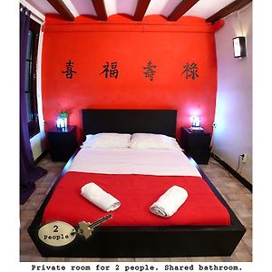 Kamer met een Queen Size Bed